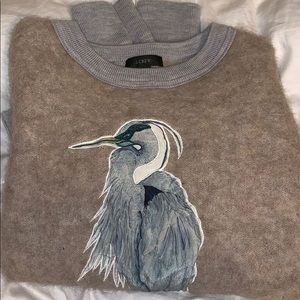 Soft sweater with bird embellishment